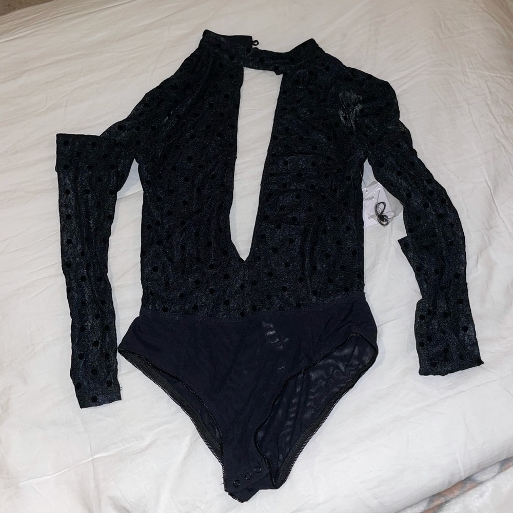 Polkadot lace deep V bodysuit.